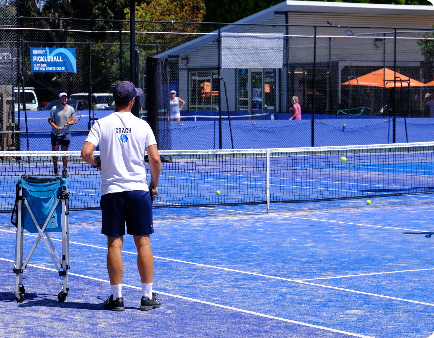 Players in a rally during a match at EPTC
